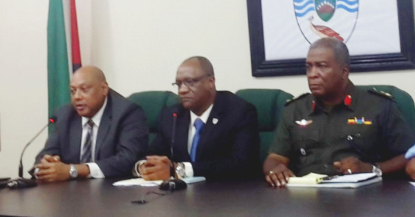 From left: Minister of Governance Raphael Trotman, Minister of State Joseph Harmon and Chief of Staff of the Guyana Defence Force Brigadier Mark Phillips at the press conference yesterday.