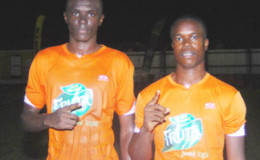 Fruta Conquerors goal scorers Dennis Edwards (left) and Kwame LaFleur pose for the camera following their hard-fought win over Monedderlust FC in the GFF Stag Beer Elite League at the Tucville Community ground
