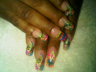 Nails by Clemencio Goddette 