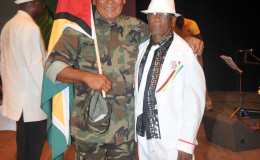 King Perai (left) with former calypso heavyweight Mighty Rebel
