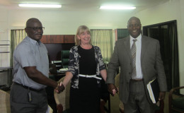 From left: Minister of Citizenship Winston Felix, Resident Representative for UNICEF Marianne Flach and Project Consultant Patrick Triumph.
