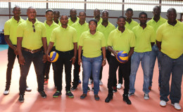 The national men’s volleyball team strike a pose with their coaches and team manager at the national gymnasium minutes before they departed for Brazil.