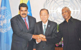United Nations Secretary-General Ban Ki-Moon (centre) joins President Nicolás Maduro of Venezuela (left) and President David Granger of Guyana in a three-way handshake at the United Nations headquarters in New York last evening. (UN photo)