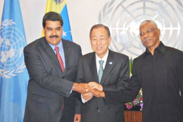 United Nations Secretary-General Ban Ki-Moon (centre) joins President Nicolás Maduro of Venezuela (left) and President David Granger of Guyana in a three-way handshake at the United Nations headquarters in New York last evening. (UN photo)