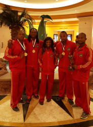 From lelft, Kerwin Clarke (light middle) fourth, Sylvester Andrews (welterweight) fourth, Alisha Fortune (Body Fitness), Emmerson Campbell 4th place and  Devon Davis (bantamweight) silver (Men’s Physique).