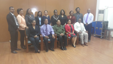 Newly appointed Board members of Guyana National Newspapers Ltd and National Communications Network pose with Prime Minister Moses Nagamootoo and the heads of those agencies this morning. From left standing are: Sohan Poonai, Margaret Lawrence, Carolyn Walcott, Dhanwanti Sukhdeo, Dr Paloma Mohamed, Karen Davis, Scherazade Ishoof-Khan, Patricia Woolford, Ruel Johnson and Imran Khan. Sitting from left are: CEO of NCN Molly Hassan, NCN - Board of Directors Chair Bishwa Panday, Prime Minister Moses Nagamootoo, GNNL Board of Directors Chair Jean La Rose, Chronicle General Manager Michael Gordon,  Missing from photo are: Board Members Bert Wilkinson, Tabitha Sarabo, Mark Archer, Kojo McPherson and Colin Thompson. 