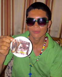  O’ Neil d’Oliveira proudly displays the CD with his R&B song