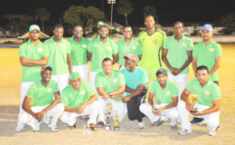 The victorious Media XI cricket team after they defeated the Floodlight Masters Friday night in a memorial match for the late sports journalist Calvin Roberts.
