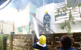 Fire-fighters extinguishing the blaze