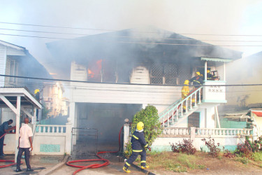 Fire gutted the building in East Street, Cummingsburg yesterday afternoon 