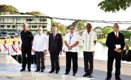 From left: President David Granger; Cuba’s Ambassador to Guyana, Julio César González Marchante; Ambassador designate from the Democratic People’s Republic of Korea, Pak Chung Yul; Honorary Consul for Barbados, Gerry Gouveia and brother of one of the victims, Rawle Thomas, Jeffery Thomas, at the wreath laying ceremony. (Ministry of the Presidency photo)