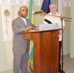 Foreign Minister Carl Greenidge speaking at the reception.  High Commissioner to Guyana, Pierre Giroux is at right. (Ministry of the Presidency photo)