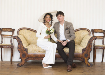 Ashma is wearing a Meiling Bridal Suit, a Jackie Habets Hat and ASOS heels. (Photo by Kimberley Martin)