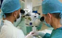Dr Joseph Pasternak guides Dr. Shailendra Sugrim, Head of the GPHC’s Ophthalmology Department, during a corneal transplant surgery. (GPHC photo)
