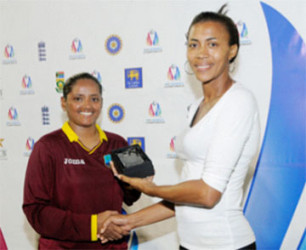 Player-of-the-Match Anisa Mohammed receives her award from former St. Lucia international Pamela Alfred during the second One-day International between West Indies Women and Pakistan Women on Sunday at the Beausejour Cricket Ground. Photo by WICB Media/Randy Brooks of Brooks Latouche Photography 