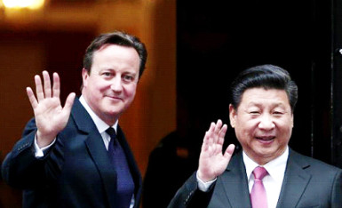 China's President Xi Jinping is welcomed by Britain's Prime Minister David Cameron to 10 Downing Street, in central London, Britain, October 21, 2015. Reuters/Suzanne Plunkett 