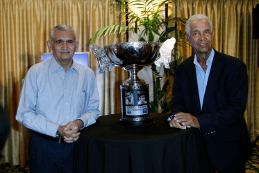 Michael Tissera (left)  and Sir Garry Sobers, who captained the teams in the West Indies vs Ceylon match in 1967, at the unveiling of the Sobers/Tissera trophy in Colombo yesterday. WICB Media Photo 