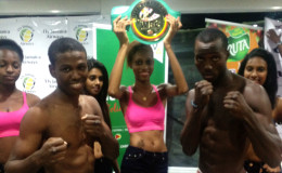 Ripped and Ready! Clive Atwell (left) and Dexter Gonsalves square off following the weigh in last night at the Giftland Mall.

