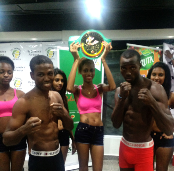 Ripped and Ready! Clive Atwell (left) and Dexter Gonsalves square off following the weigh in last night at the Giftland Mall. 