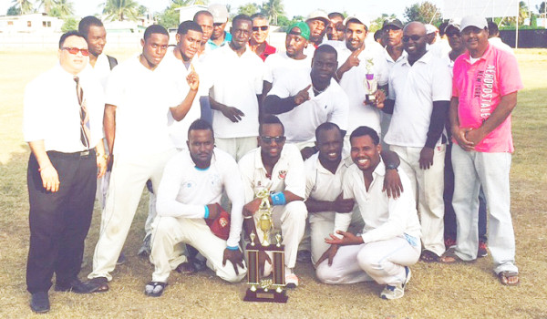 The victorious Bravados team pose with their spoils in the presence of EECB President Bissoondyal Singh.