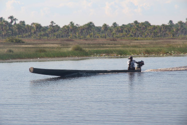 A villager boating along the conservancy canal
