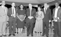 UWI honorary graduates 2015, from left, Rajkumar “Krishna” Persad, Degree of Doctor of Letters (DLitt); Gerard Besson, Doctor of Letters (DLitt); Marjorie Thorpe, Doctor of Letters; Norman Sabga, Doctor of Letters; Justice Jean Angela Permanand, Doctor of Laws (LLD); Hollis Raymond Charles, Degree of Doctor of Science (DSc), and David Michael Rudder, Doctor of Letters.  The grads were guests of honour at a reception hosted by UWI St Augustine Campus Prof Clement Sankat at the office of the campus principal on Friday.  PHOTO: ANDRE ALEXANDER