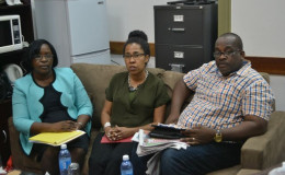 Minister within the Ministry of Public Health Dr. Karen Cummings (left) along with Dr.  Nathilee Caldeira (centre) and a member of her team (GINA photo)
 

