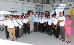 Officials of the Ministry of Education, RAM and the school in front of the aircraft. (Ministry of Education photo)
