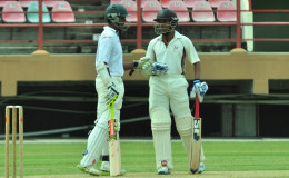 Shiv Chanderpaul and Vishaul Singh have a chat between overs during their time in the middle.