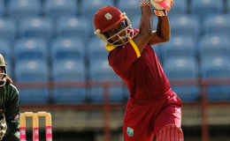 Deandra Dottin drives powerfully through the off-side during her unbeaten 38 in the opening Twenty20 International against Pakistan Women here Thursday. (Photo courtesy WICB Media)