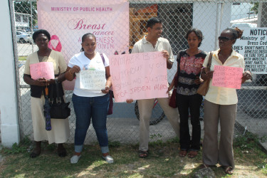 Nathalie Caseley (second from left), flanked by supporters, including human rights activists Vidyaratha Kissoon and Sherlina Nageer (third and fourth from left). (Photo by Keno George)