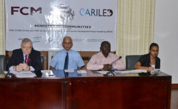 Minister of Communities Ronald Bulkan (second from left) , Permanent Secretary Emile McGarrell (third from left) , Principal Municipal Services Officer Nandranie Harrichan (right) and Canadian High Commissioner Pierre Giroux at the workshop for the Development of Plans of Actions for Municipal Development. (GINA photo)