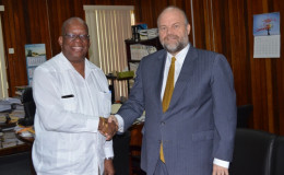 Ambassador of the United States of America, Perry Holloway (right)  paying a courtesy call today on Finance Minister Winston Jordan to discuss matters of mutual interest (GINA photo)