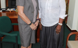 First Lady  Sandra Granger (left) and  Paula Mohammed-Benjamin, a Board member of the Foundation for the Development of Caribbean Children,  during their meeting, earlier today, at State House. (GINA photo)