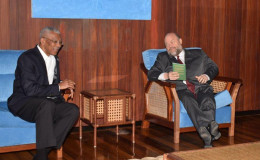 During his first meeting with President David Granger (left), United States Ambassador, Perry Holloway, today, pledged his commitment to work with the Government of Guyana in the areas of crime and security and battling the narco-trade, a release from the Ministry of the Presidency said. (Ministry of the Presidency photo)