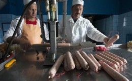 
Employees make sausages at a meat processing plant run by the Belarussian Republican Union of Consumer Societies in the town of Kletsk, Belarus July 1, 2015.
Reuters/Vasily Fedosenko
