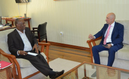 Spain’s Ambassador to Guyana, Jose Maria Fernandez Lopez (right), this afternoon, paid a courtesy call, on Minister of State, Joseph Harmon.  In an invited comment, the Ambassador said that his discussions with the Minister were focused on promoting closer bilateral relations between the Guyana and Spain. (Ministry of the Presidency photo)