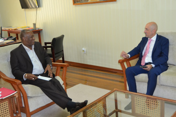 Spain’s Ambassador to Guyana, Jose Maria Fernandez Lopez (right), this afternoon, paid a courtesy call, on Minister of State, Joseph Harmon.  In an invited comment, the Ambassador said that his discussions with the Minister were focused on promoting closer bilateral relations between the Guyana and Spain. (Ministry of the Presidency photo)