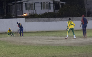 Action in last evening’s finals of the Guyana Softball Cup 5 tournament.