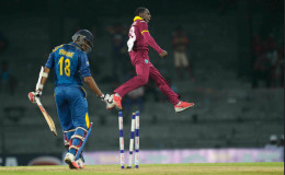 Jonathan Carter jumps in delight following the dismissal of Sachithra Senanayake during the opening One-Day International against Sri Lanka yesterday. (Photo courtesy WICB Media)