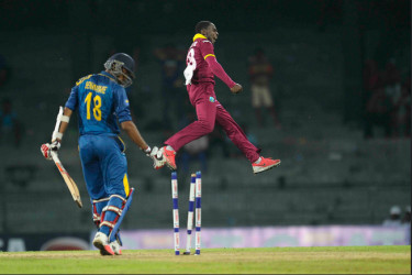 Jonathan Carter jumps in delight following the dismissal of Sachithra Senanayake during the opening One-Day International against Sri Lanka yesterday. (Photo courtesy WICB Media)  