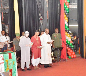 From left: Shaik Moen ul Hack from the Central Islamic Organisation, Pandit Danesh Prashad and Pastor George Jeffers offered prayers as representatives of the three main religious faiths in Guyana.  (GINA photo)