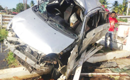 The vehicle in which Paula Kissoondial, 53, and Akeem Harry, 15, were travelling after the accident that claimed both their lives and left three others injured. 