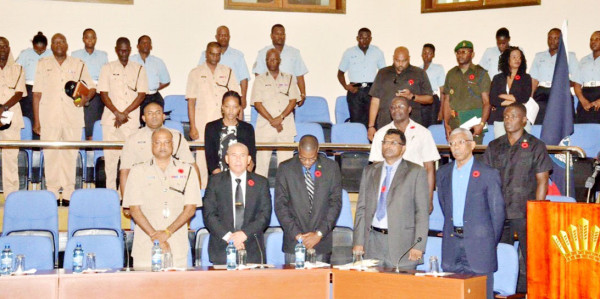 A moment of silence for all the lives lost in fatal accidents. From right are President David Granger, Vice President and Minister of Public Security, Khemraj Ramjattan, Minister of Public Infrastructure, David Patterson, Minister of Public Health, Dr. George Norton and Police Commissioner, Seelall Persaud. (Ministry of the Presidency photo) 