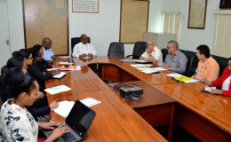 Minister of Finance Winston Jordan (centre) with the private sector delegation (right) (Ministry of Finance photo)
