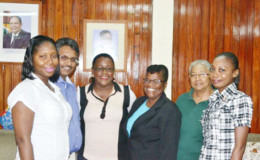 Minister within the Ministry of Social Protection, Simona Broomes (third from left), Chairperson of the National Commission on Disabilities (NCD), Evelyn Hamilton (second from right), Executive Secretary, Beverley Pile (third from right), Communications Officer, Avonel Carrica, Programme Officer, Zoan Williams, and Representative of the Private Sector, Komal Singh (second from left) after the meeting at the Ministry of Social Protection  Department of Labour, Brickdam (GINA photo)