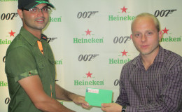 Kian Jabour (left) with Heineken Brand Manager in Guyana Robert Hiscock. 