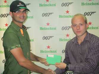 Kian Jabour (left) with Heineken Brand Manager in Guyana Robert Hiscock. 