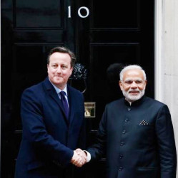 Prime Minister Narendra Modi’s is greeted by Britain’s Prime Minister David Cameron outside 10 Downing Street, in London, November 12, 2015. Reuters/Peter Nicholls 