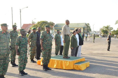 President David Granger (on dais), Prime Minister Moses Nagamootoo, Minister of State Joseph Harmon and Minister of Legal Affairs Basil Williams at the Square of the Revolution as Guyana Defence Officers were staging the army’s 50th anniversary route march (GINA photo) 